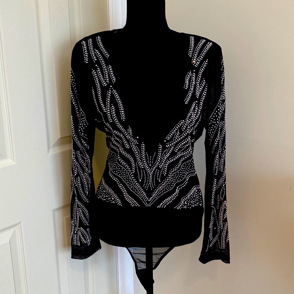 Black bodysuit with amazing beading, with a sexy see-through, snap bottom.